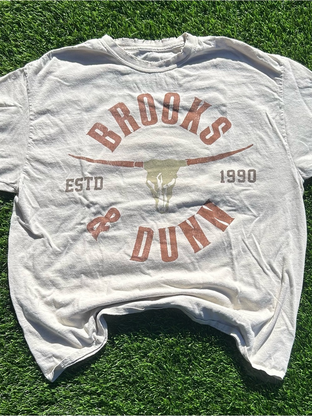 Brooks White Tee with Rust Graphic and Gold Skull